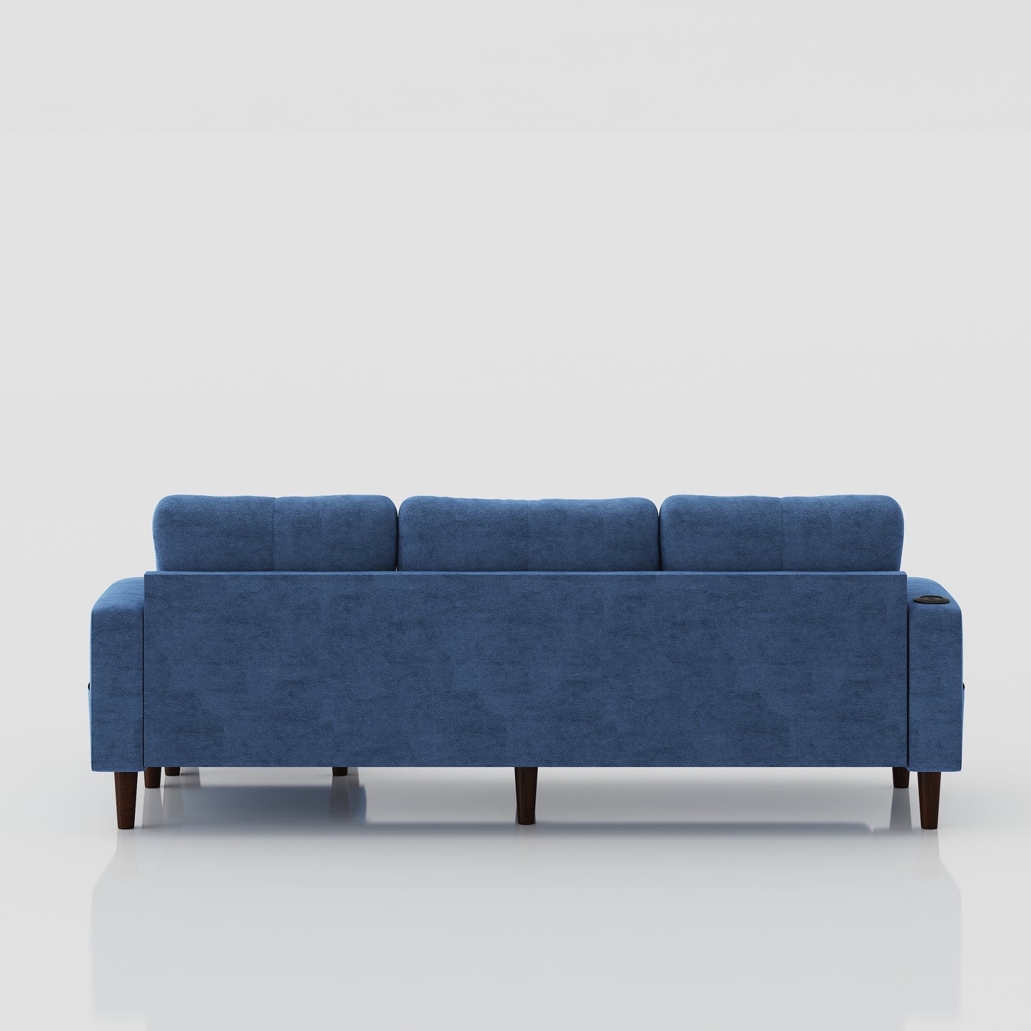Blue velvet threeseater sofa with tufted back cushions and dark wooden legs