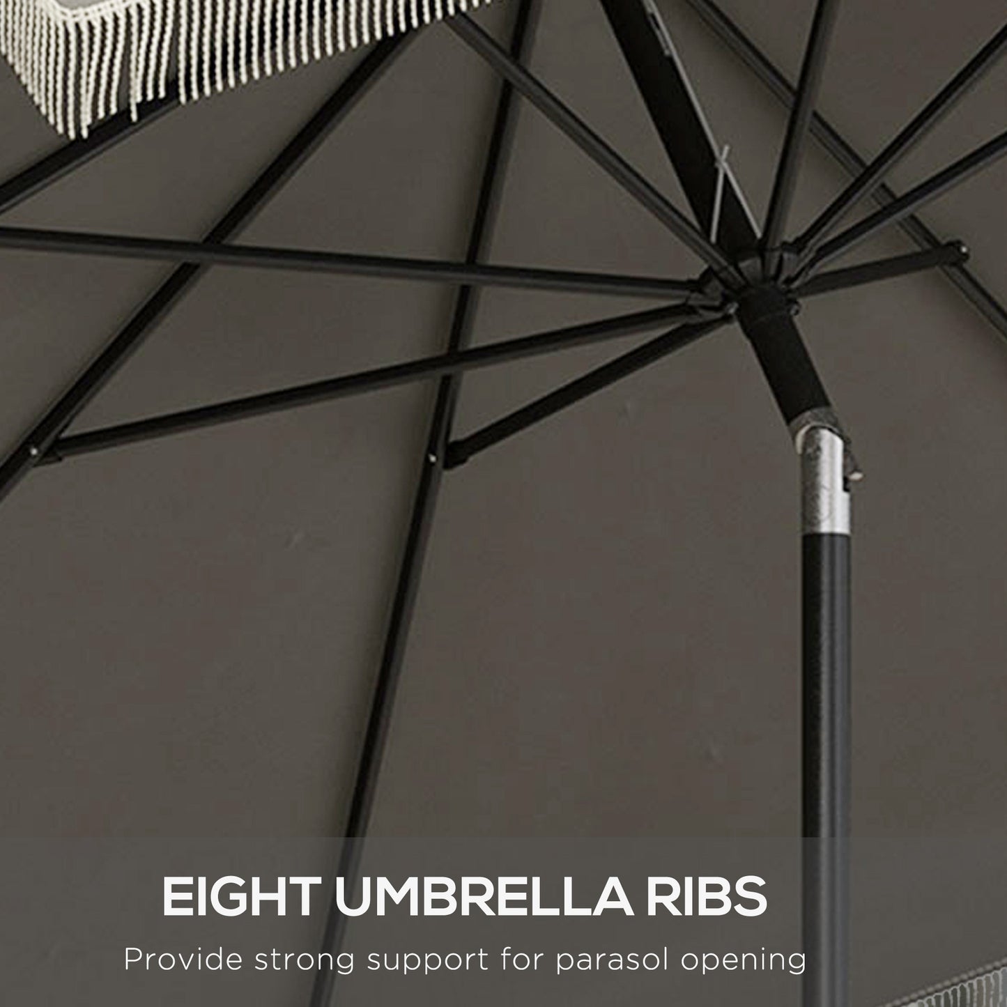 Closeup of gray patio umbrella fabric and metal ribs for strong support