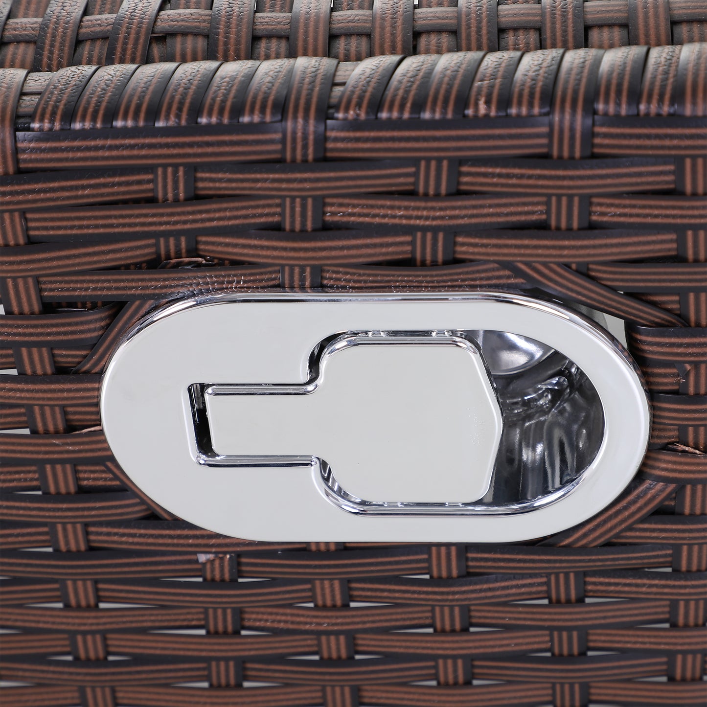 Brown wicker texture with a polished chrome recliner handle