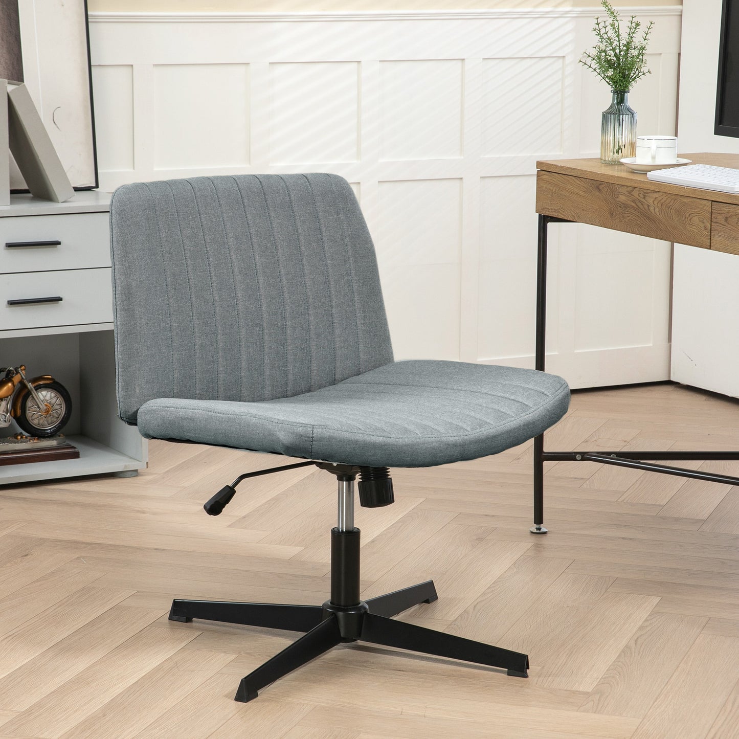 Gray fabric task chair with vertical channel tufting and adjustable height