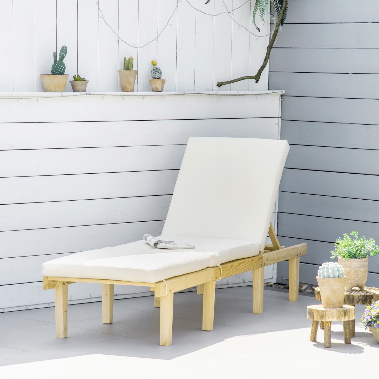 Cream cushioned wooden chaise lounge with adjustable backrest perfect for patio relaxation
