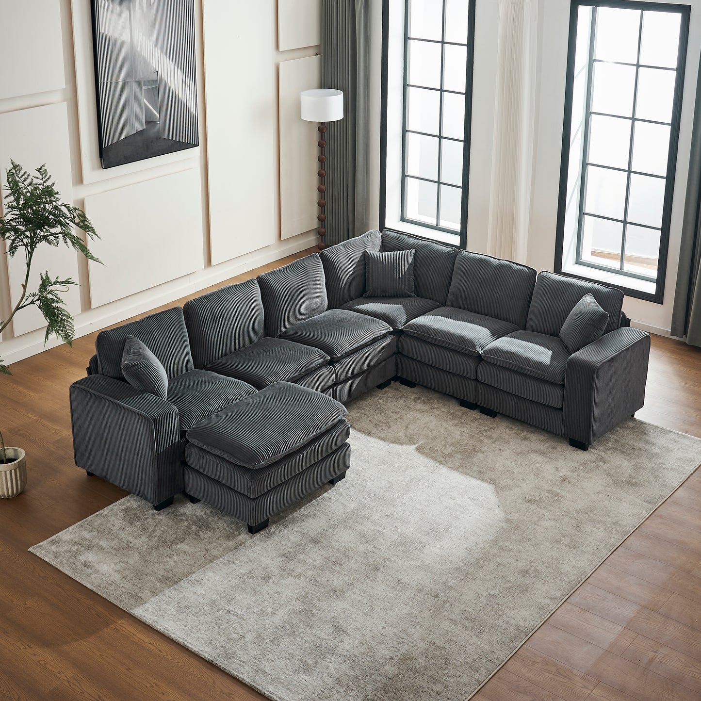 Dark grey corduroy sectional sofa with ottoman for living room comfort