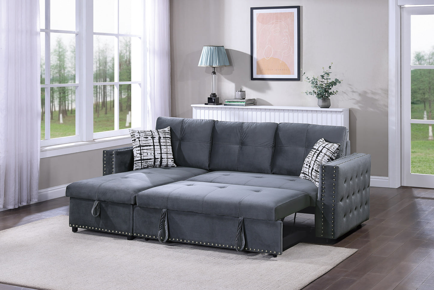 Dark gray velvet sectional sofa with pullout bed and tufted accents