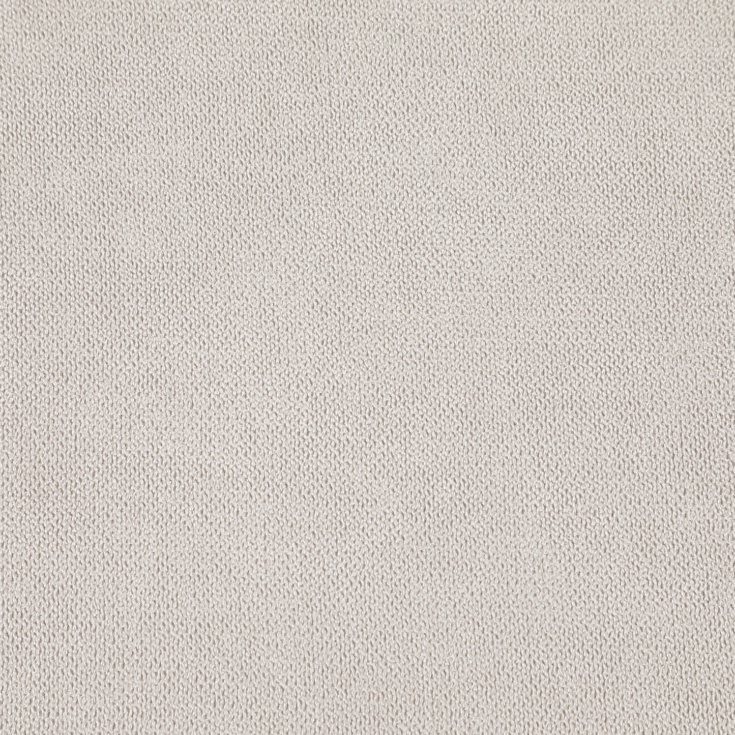 Closeup of light beige textured fabric ideal for upholstery projects