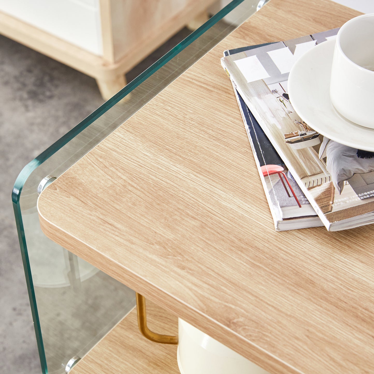 Light wood grain accent table with clear glass edge detail