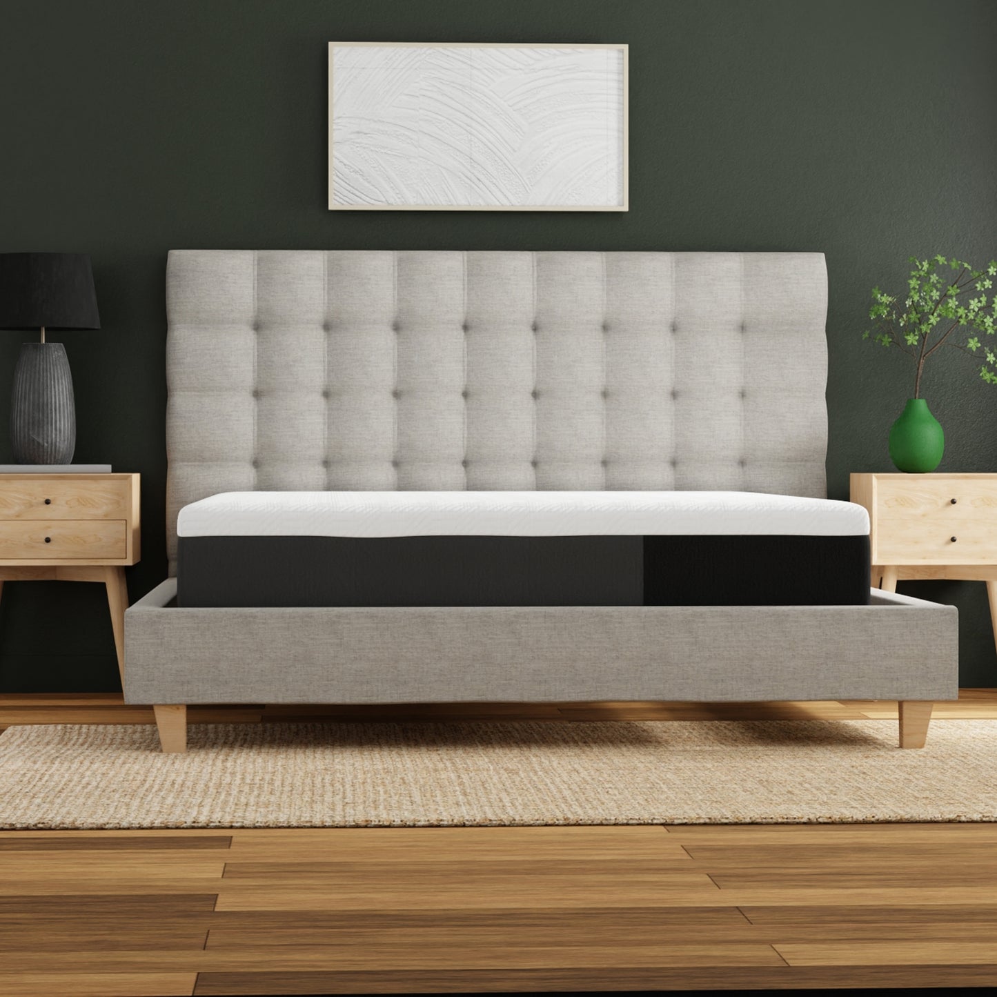 Plush queen memory foam mattress with white and dark grey layers on a grey upholstered bed frame