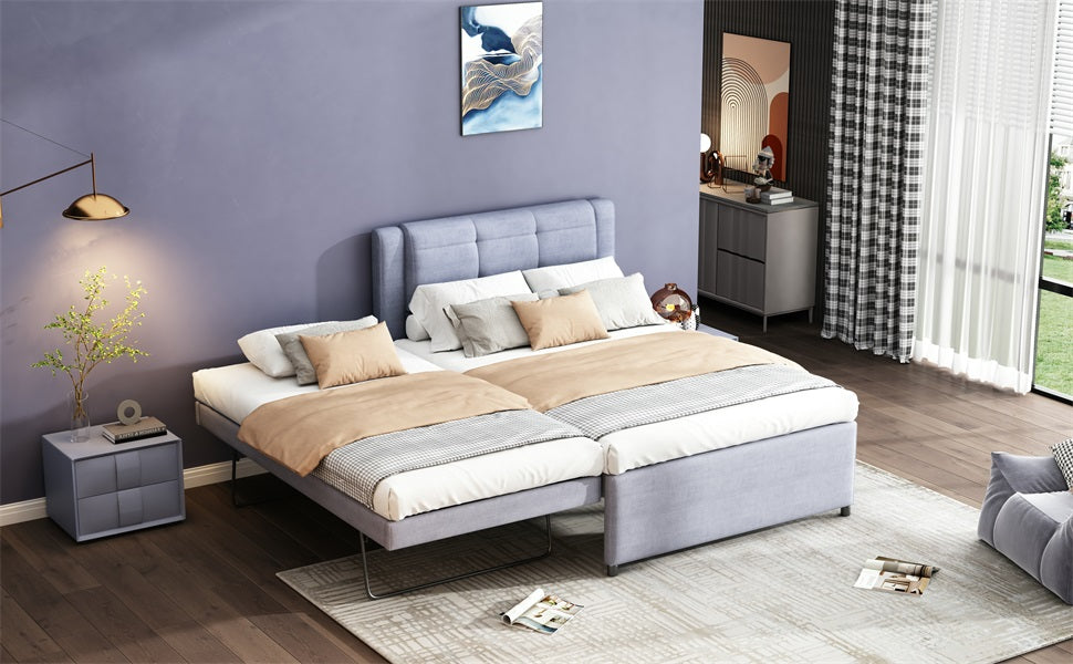Modern grey upholstered twin bed frame with pullout trundle ready for guest use