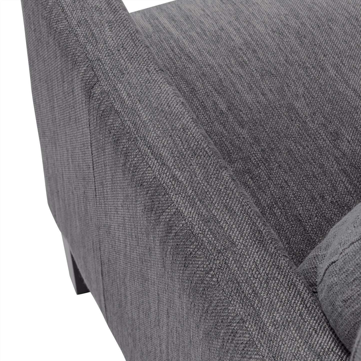 Closeup of a textured grey fabric armchair showing its woven detail and elegant stitching