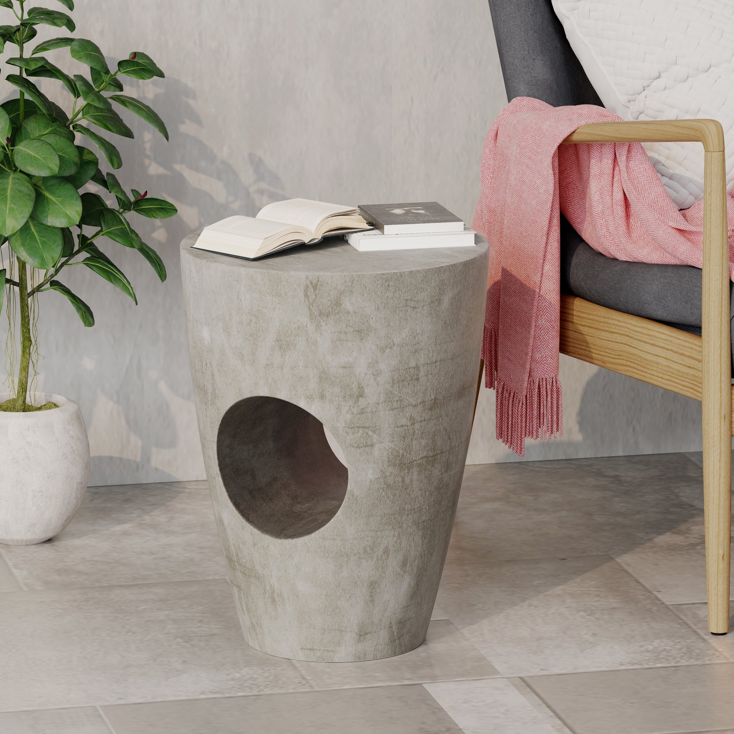 Round gray concrete side table with cutout perfect accent for modern living rooms