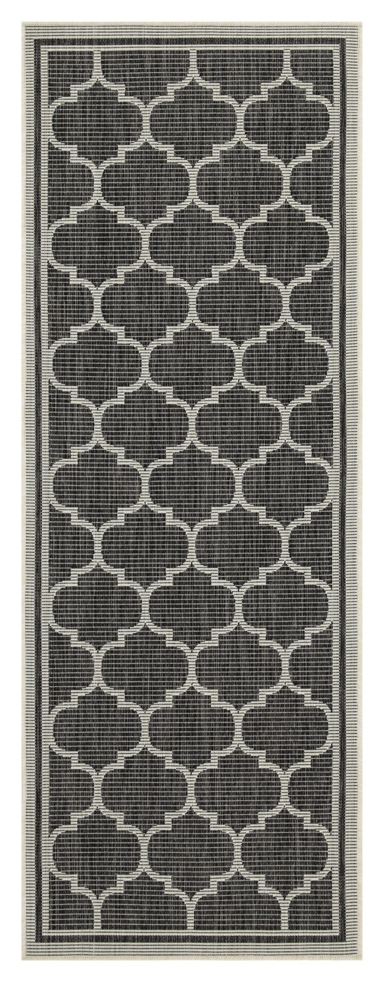 Dark grey and white trellis pattern outdoor rug made from durable woven material