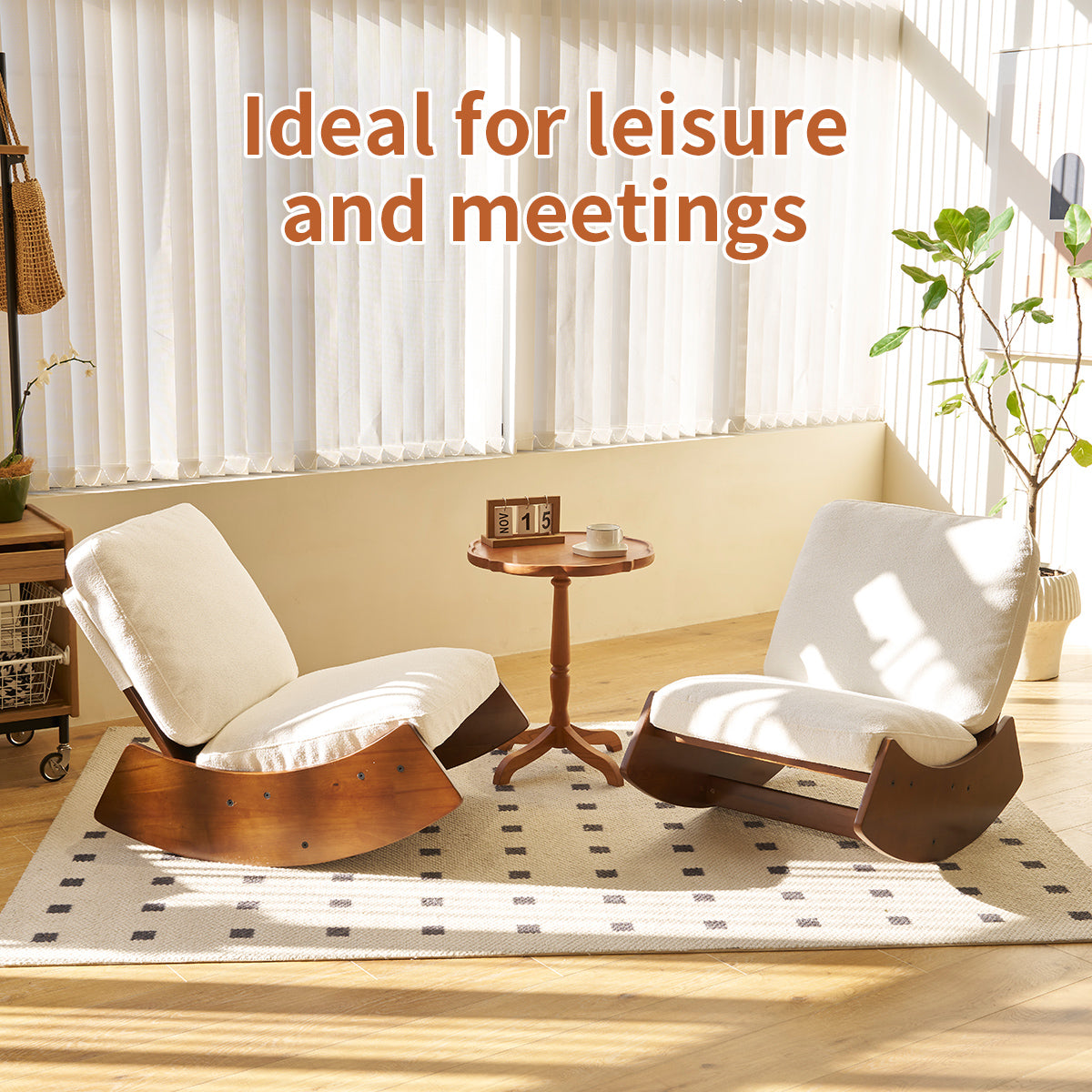Two modern rocking chairs with white cushions and dark wood bases on a patterned rug