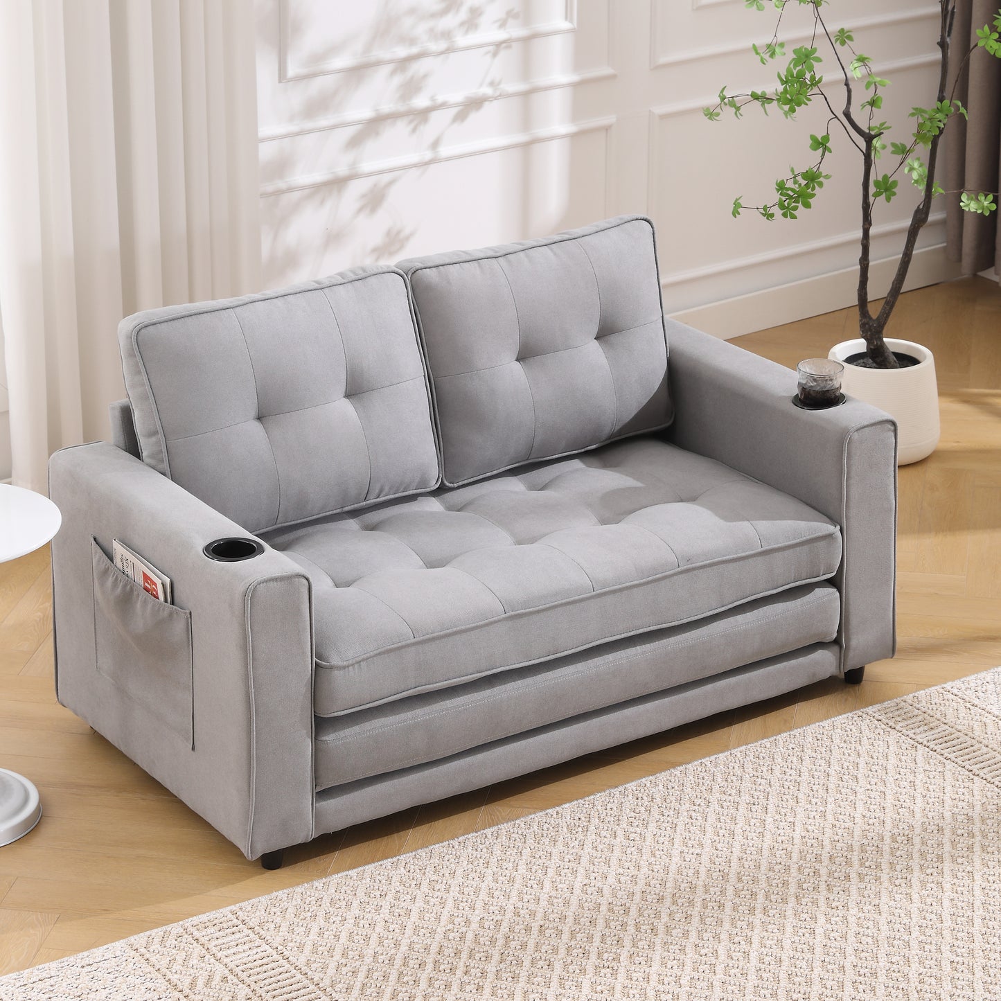 Gray tufted loveseat sofa with builtin cup holders and side storage pocket