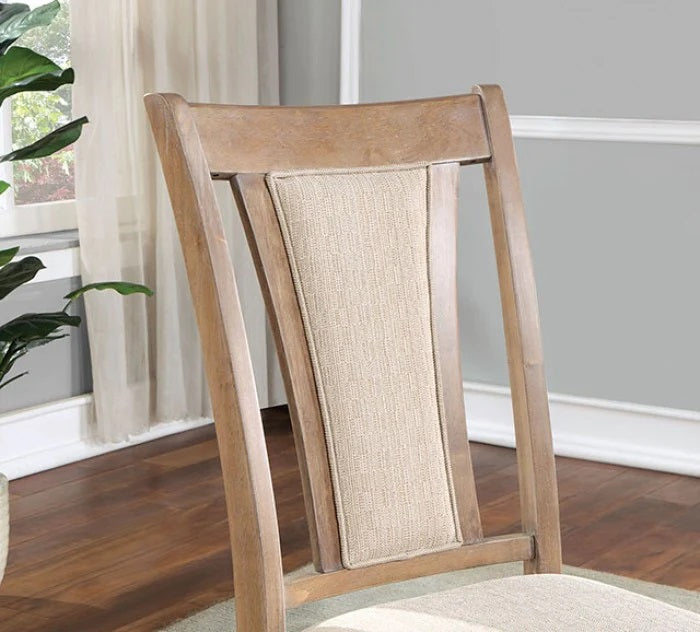 Tan upholstered back dining chair with a light wood frame