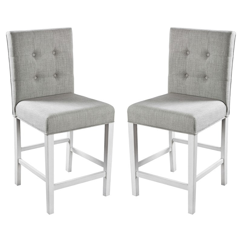 Two tufted grey fabric bar stools with white wooden frames
