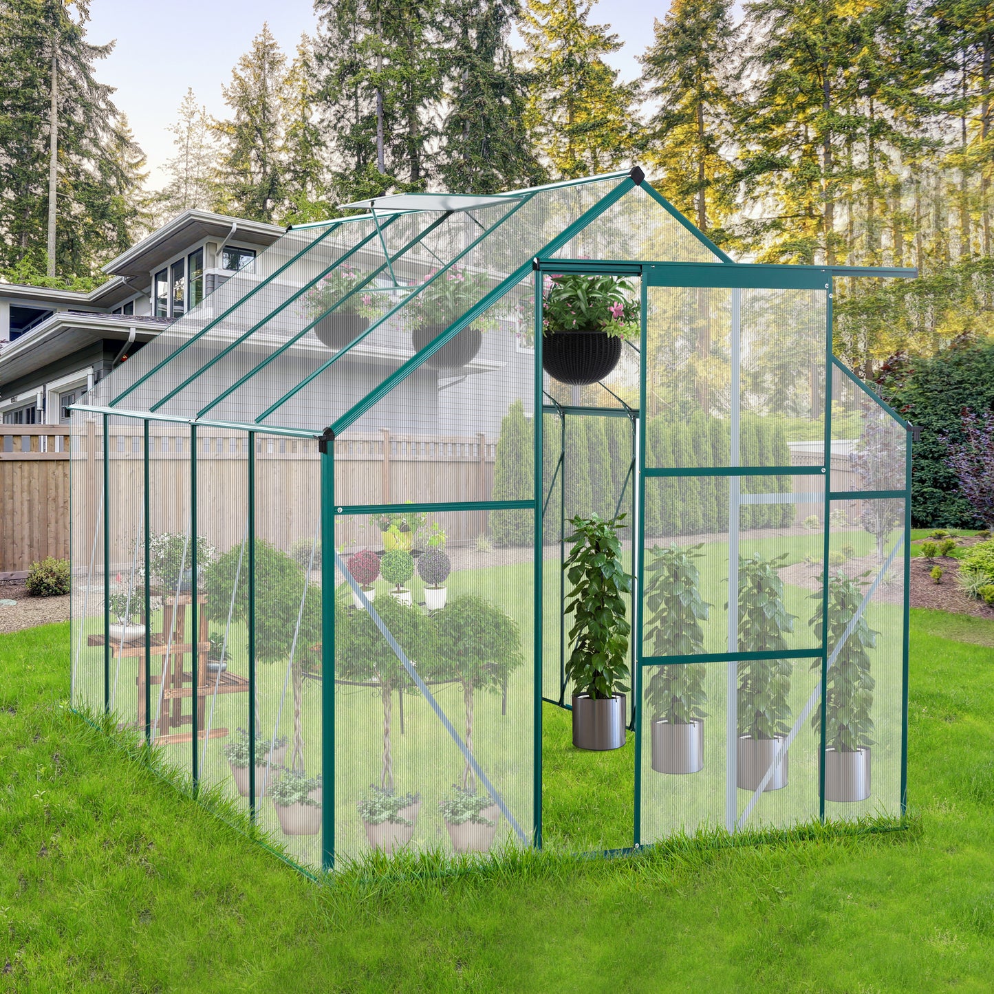 Green aluminum frame greenhouse with transparent panels ideal for backyard gardening