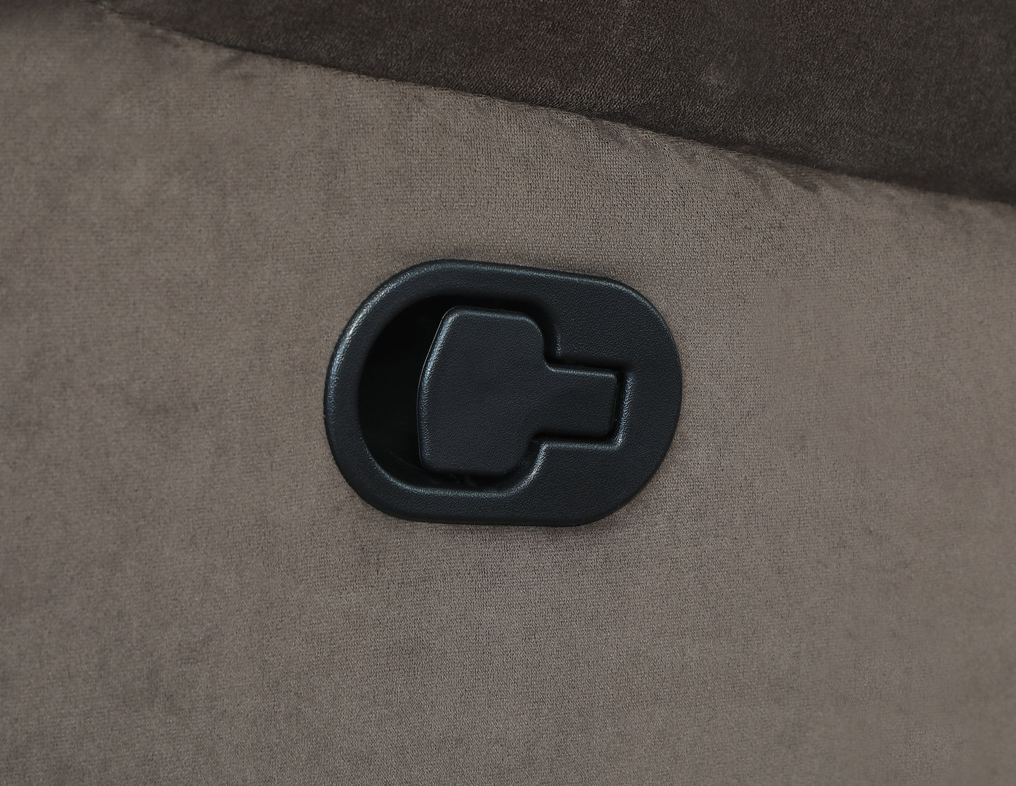 Closeup of a brown recliner handle mechanism on textured fabric