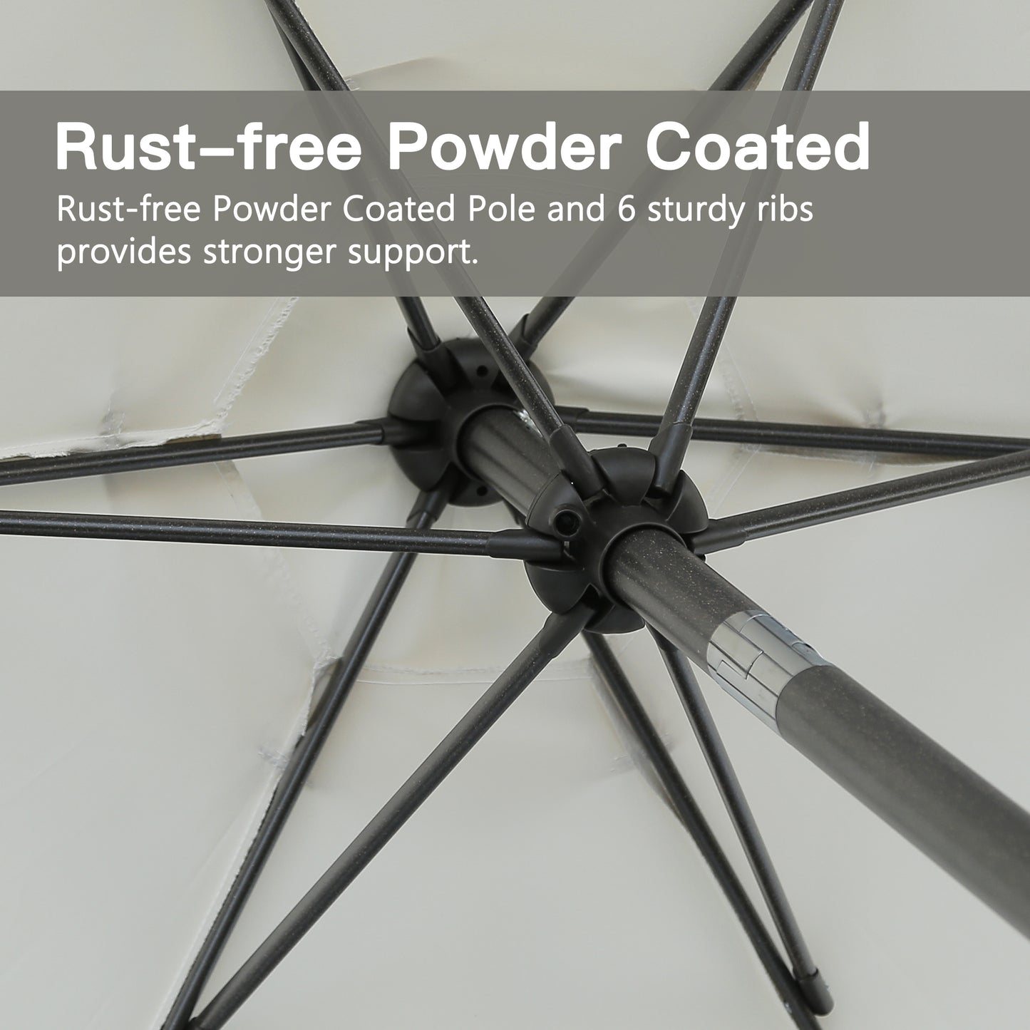 Closeup of rustfree powder coated umbrella pole with sturdy black ribs for support