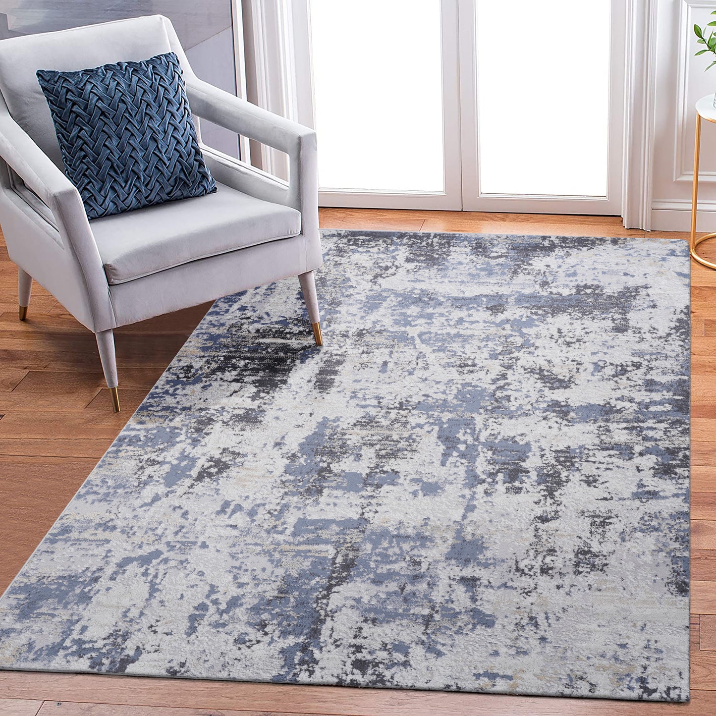 Modern abstract area rug in grey blue and cream tones