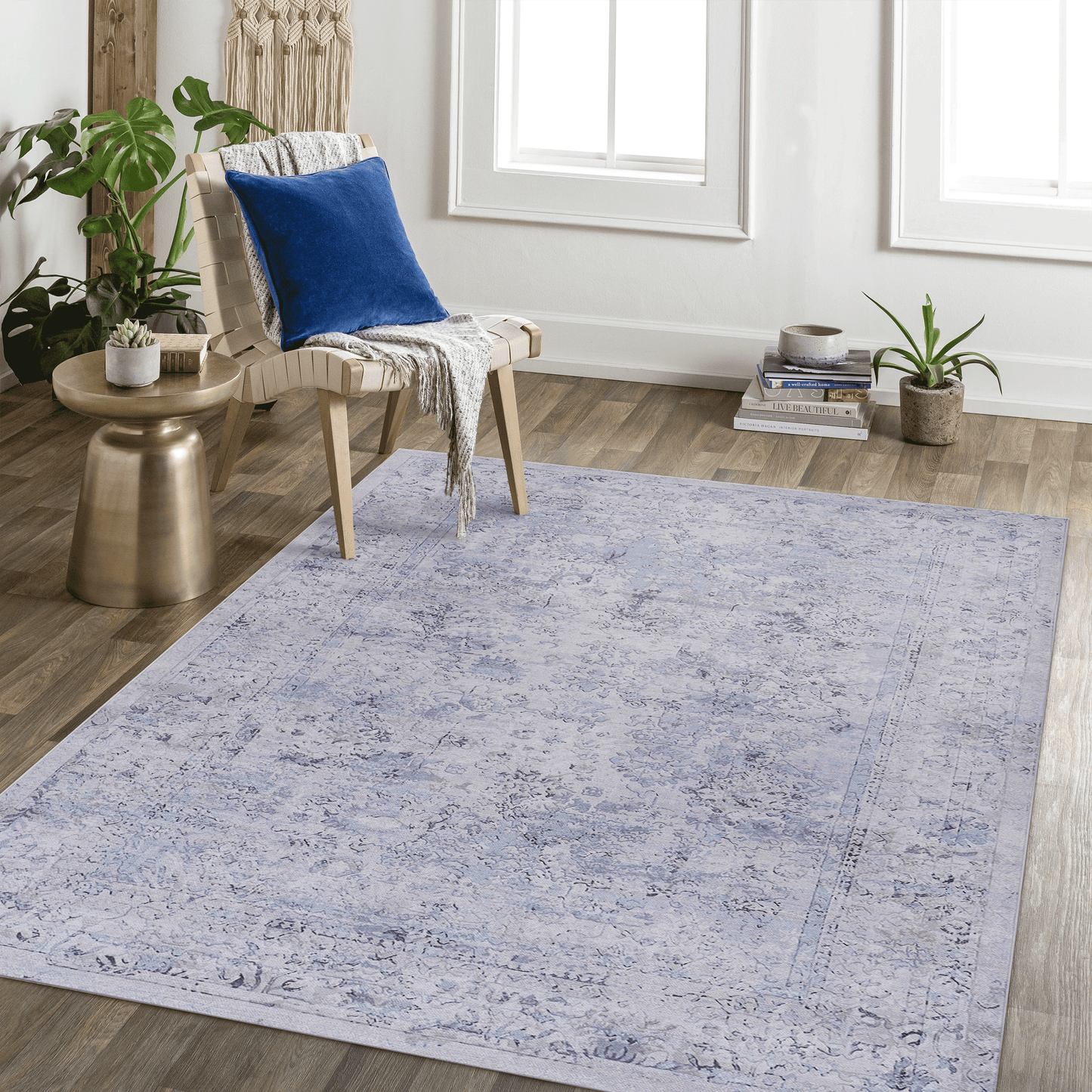 Pale blue traditional distressed Persian rug with intricate floral patterns and a detailed border