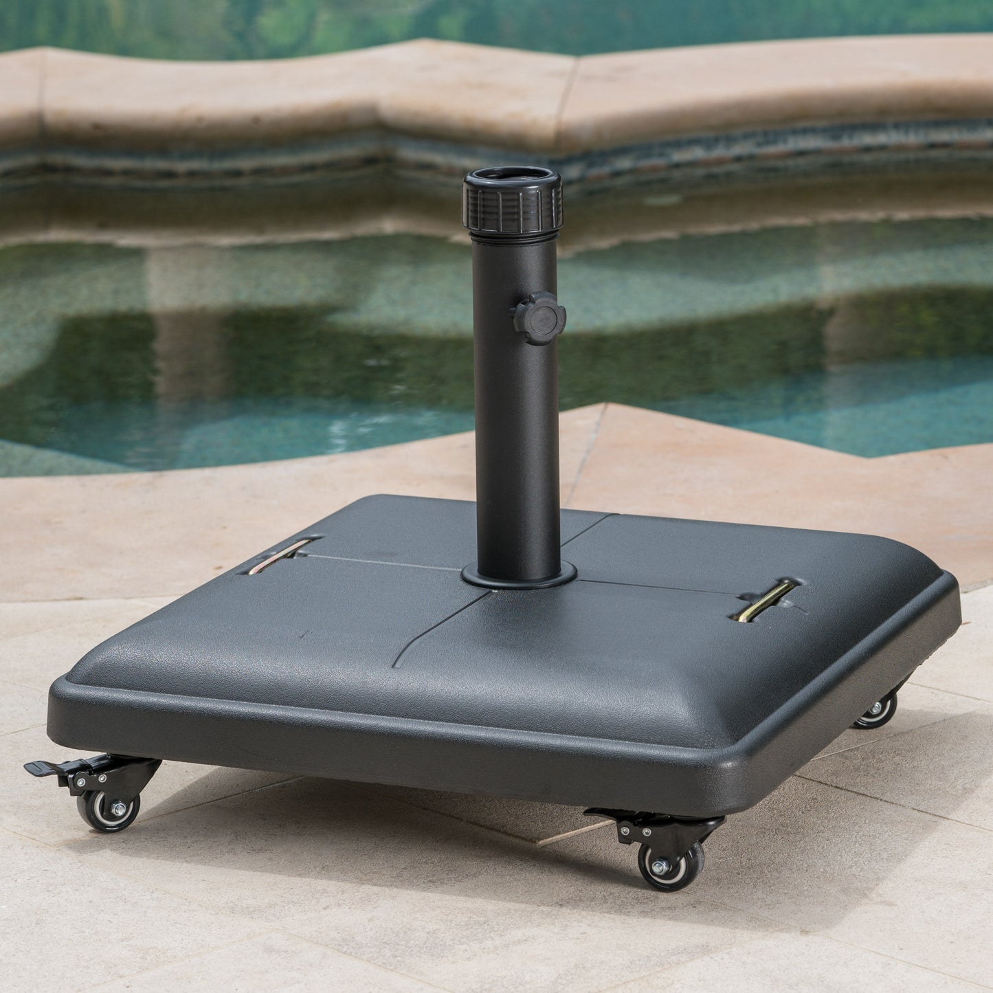 Black rolling patio umbrella base with adjustable height pole holder