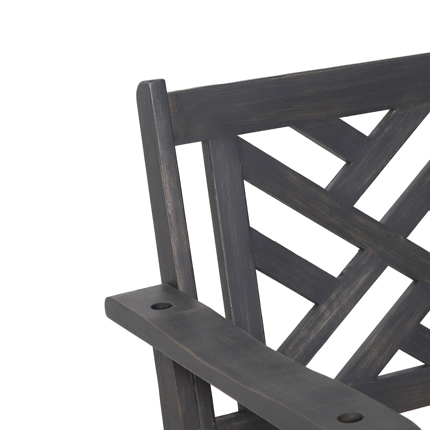 Closeup of dark brown wooden garden bench armrest and lattice back detail