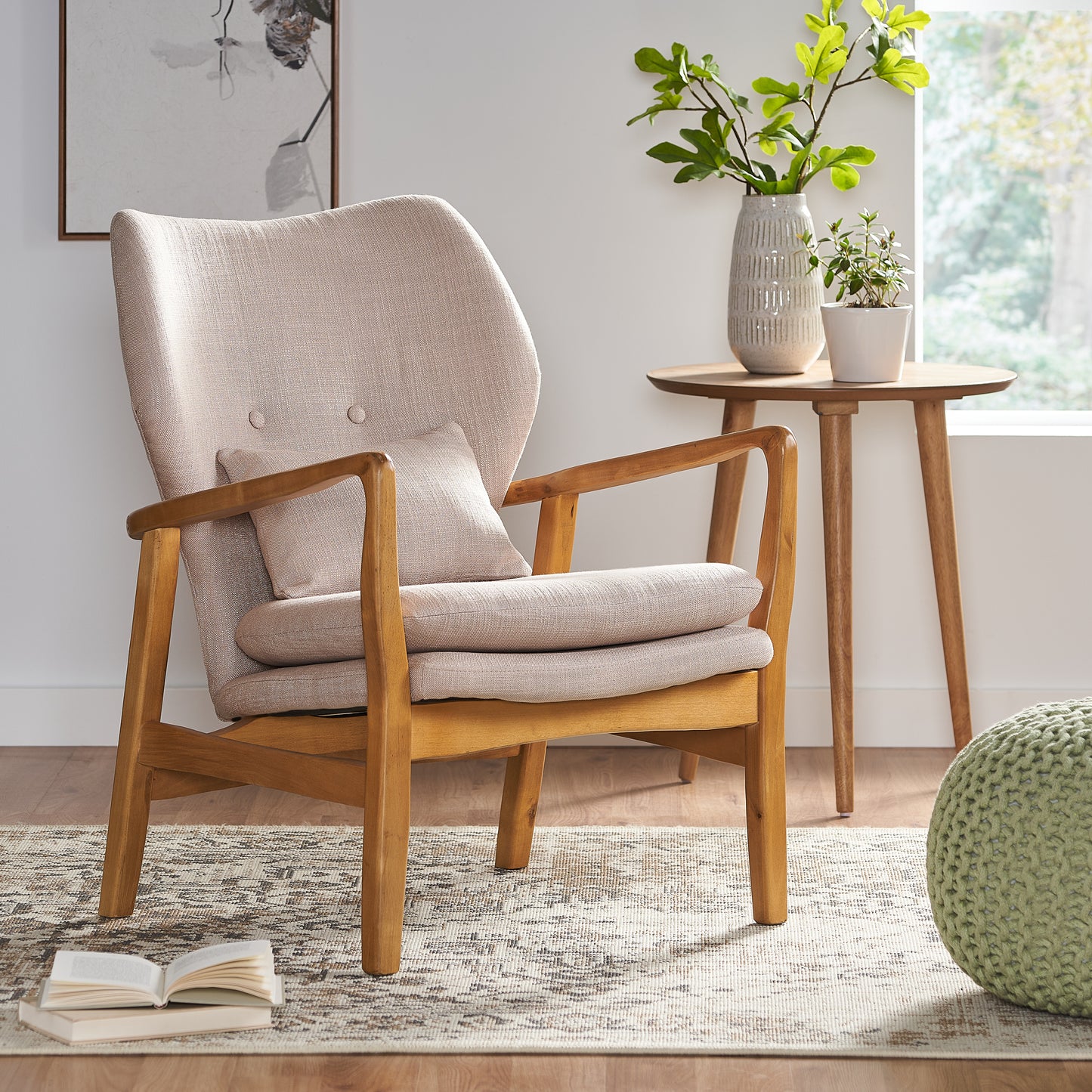 Midcentury modern accent chair with light beige textured fabric and natural wood frame