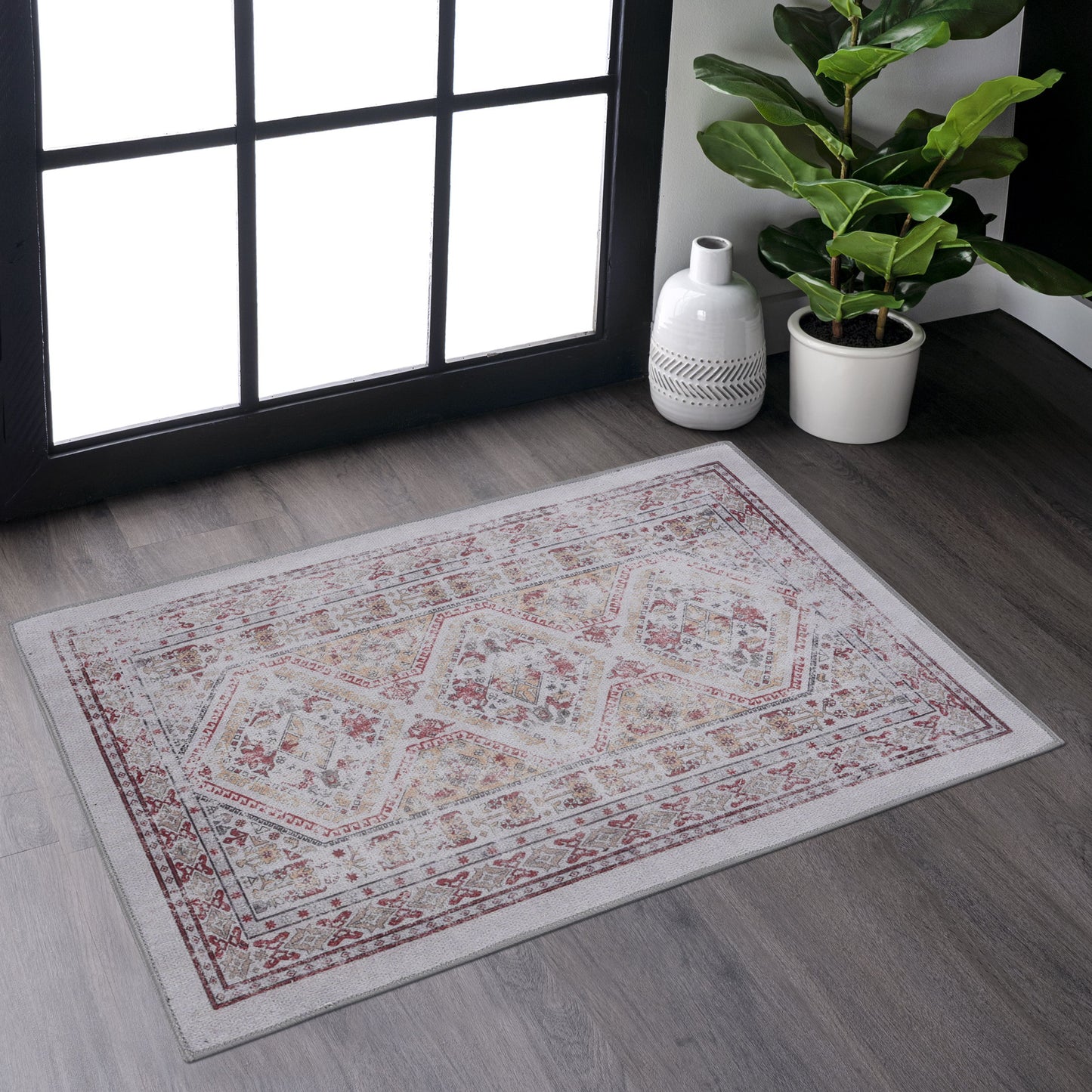 Distressed Persian rug with intricate geometric patterns in red cream and gold tones