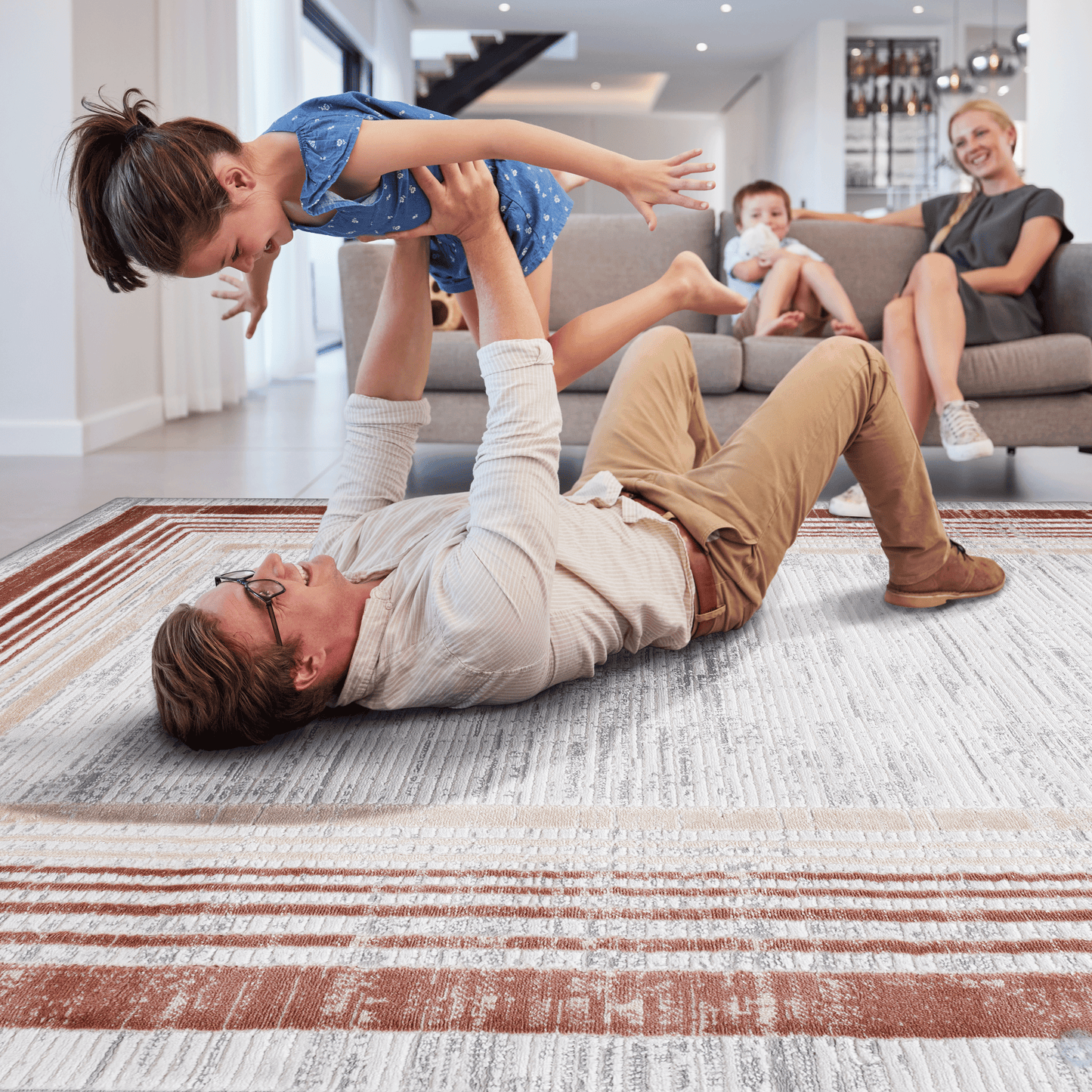 Striped accent rug in cream beige and rust with a textured finish