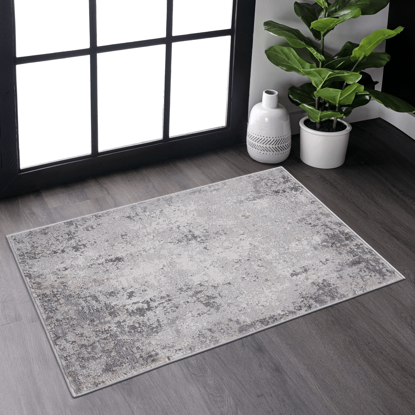 Modern abstract rug with grey white and beige distressed patterns perfect for living room decor