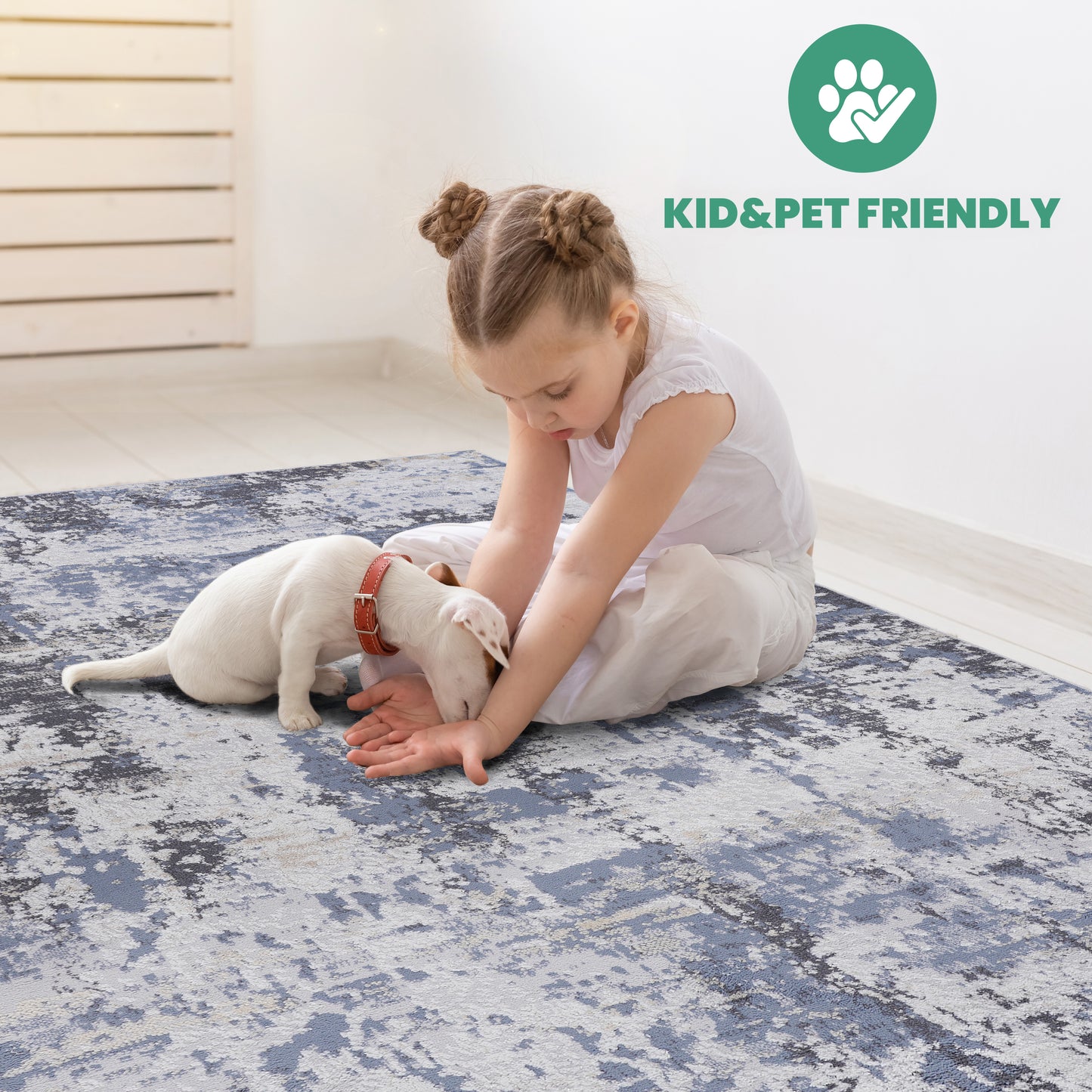 Abstract blue and grey rug with distressed pattern child and puppy playing