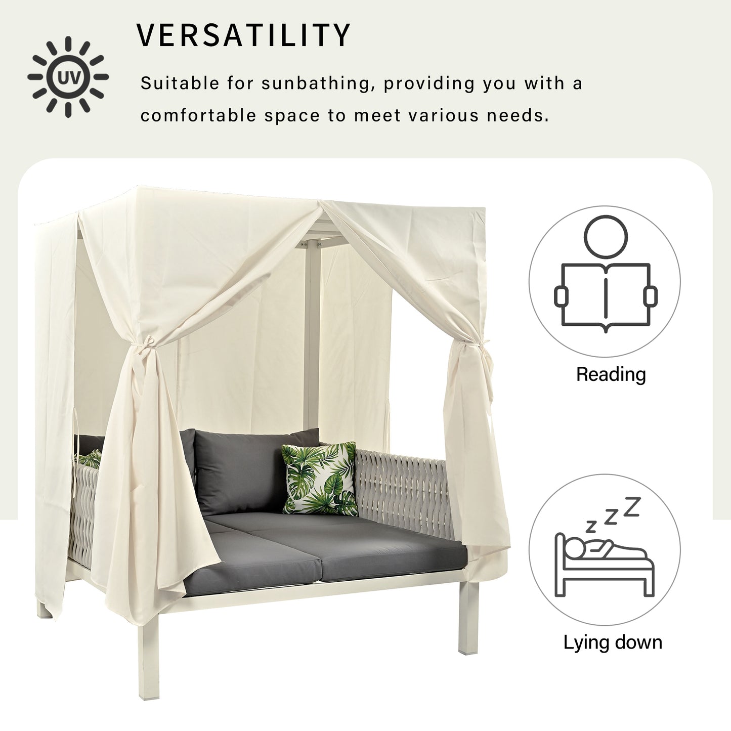 Outdoor daybed with cream canopy grey cushions and tropical accent pillow