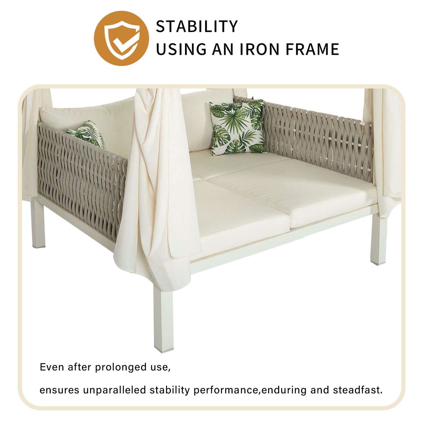 White outdoor canopy daybed with neutral cushions and tropical pillows featuring a woven gray frame