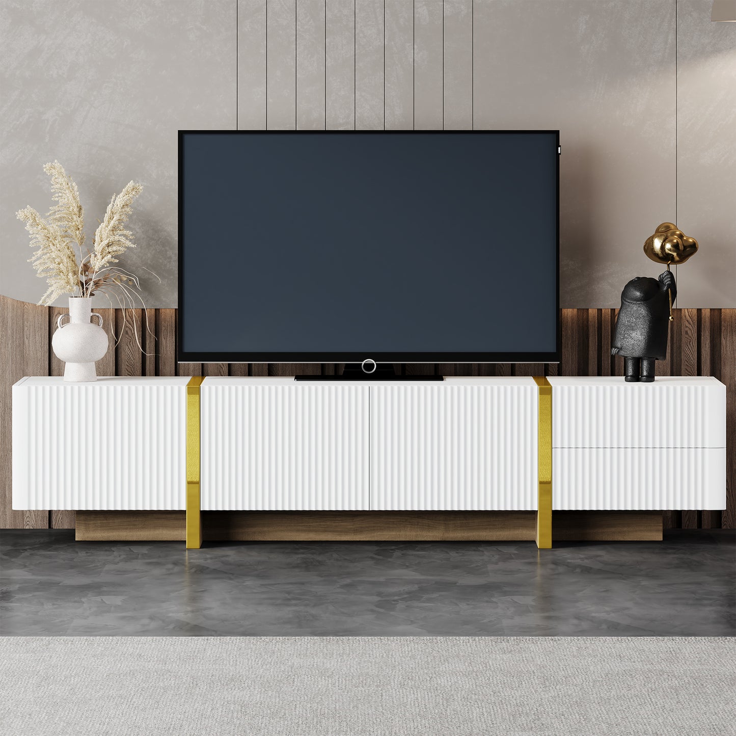 White fluted media console with gold accents and a large TV screen