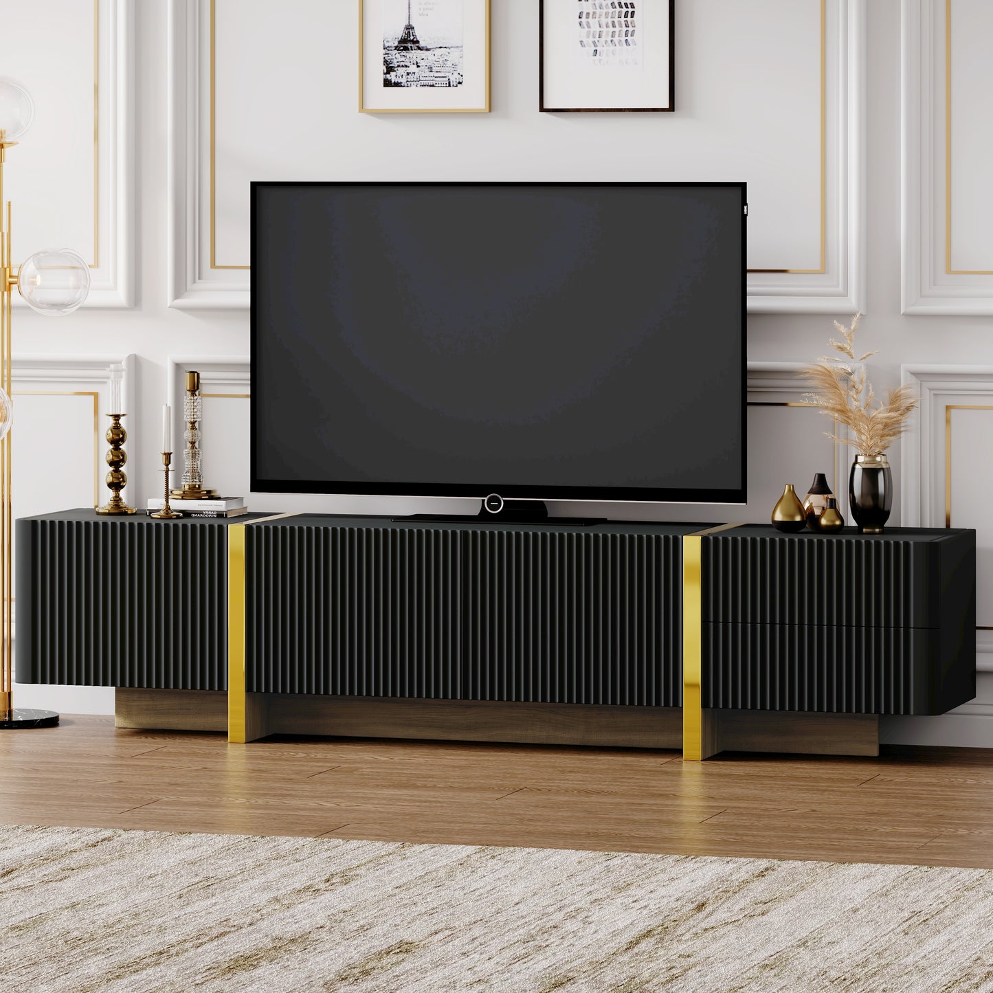 Sleek black media console with fluted doors and gold accents perfect for living room storage