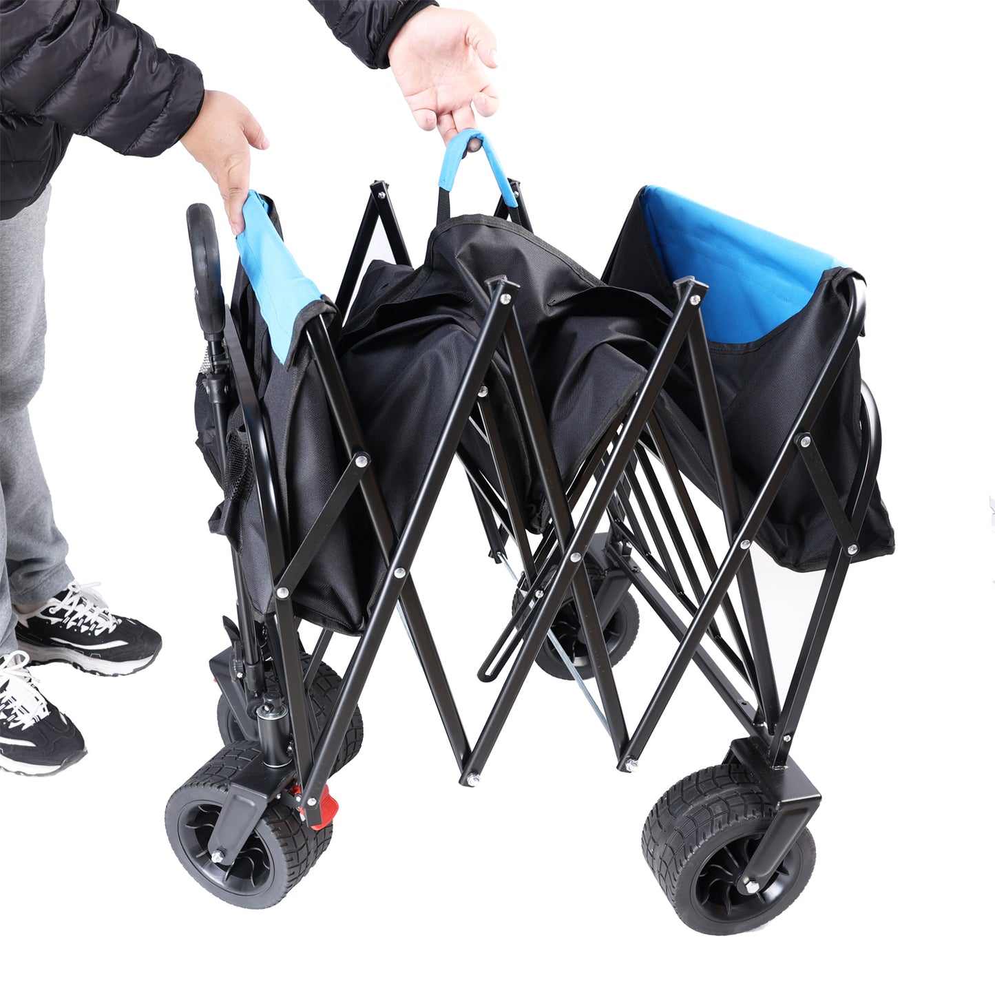 Black and blue folding wagon for outdoor use with sturdy wheels and adjustable handle