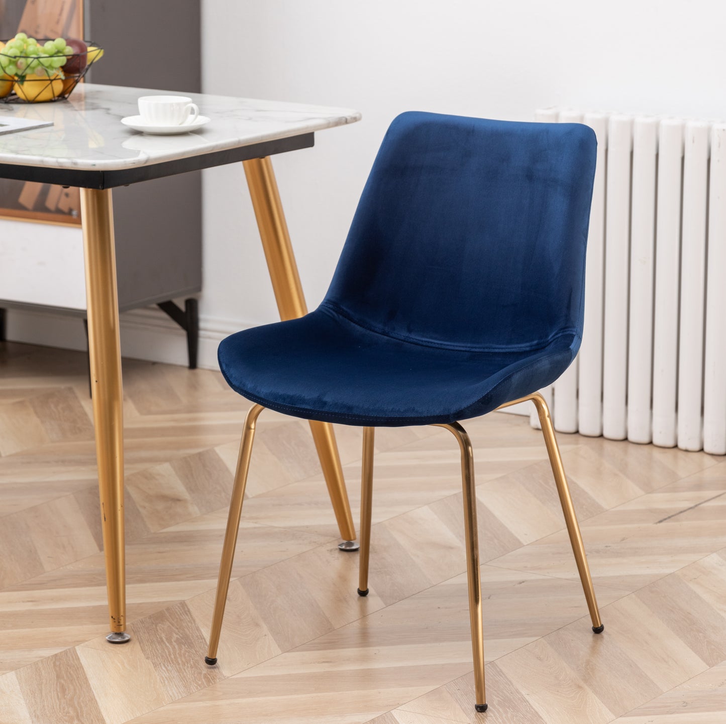 Navy velvet dining chair with gold metal legs