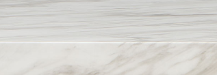 White marble countertop edge detail with subtle grey veining