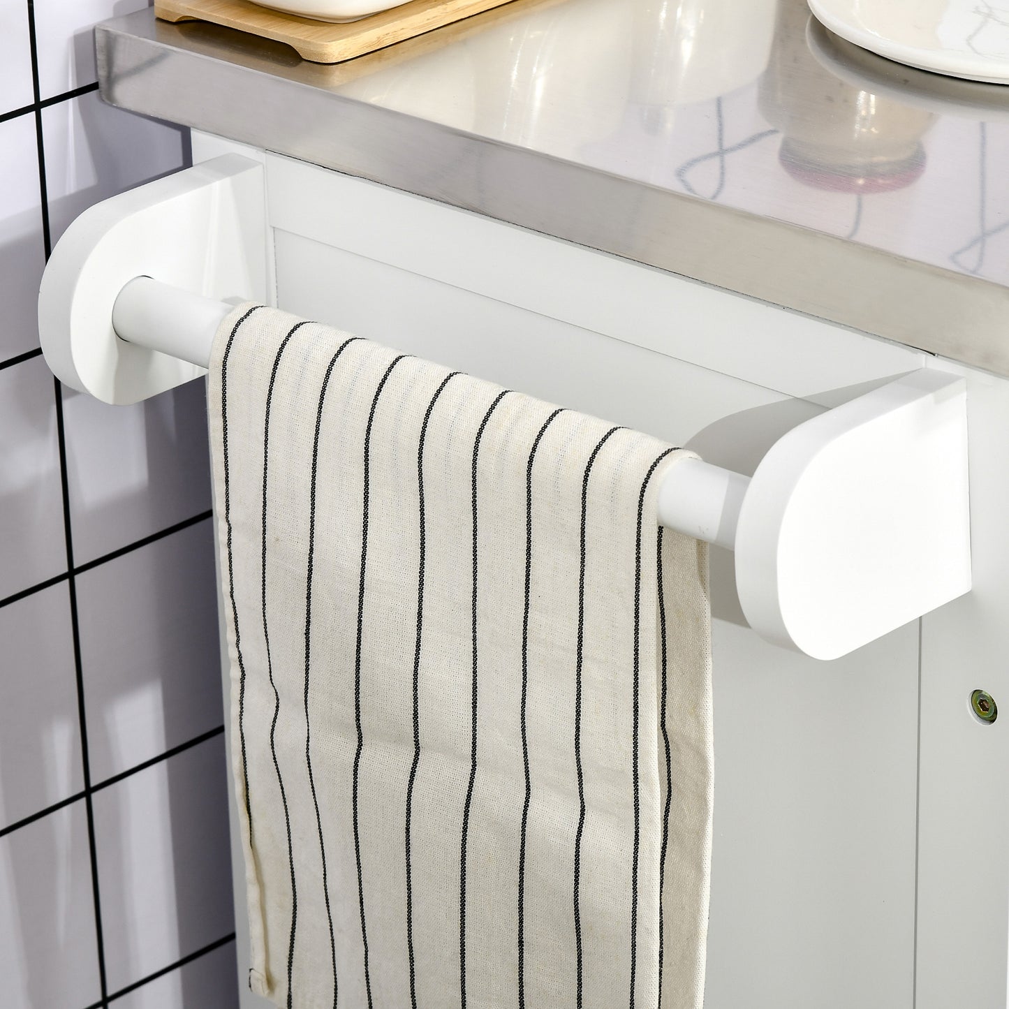 White kitchen towel rack with black striped towel