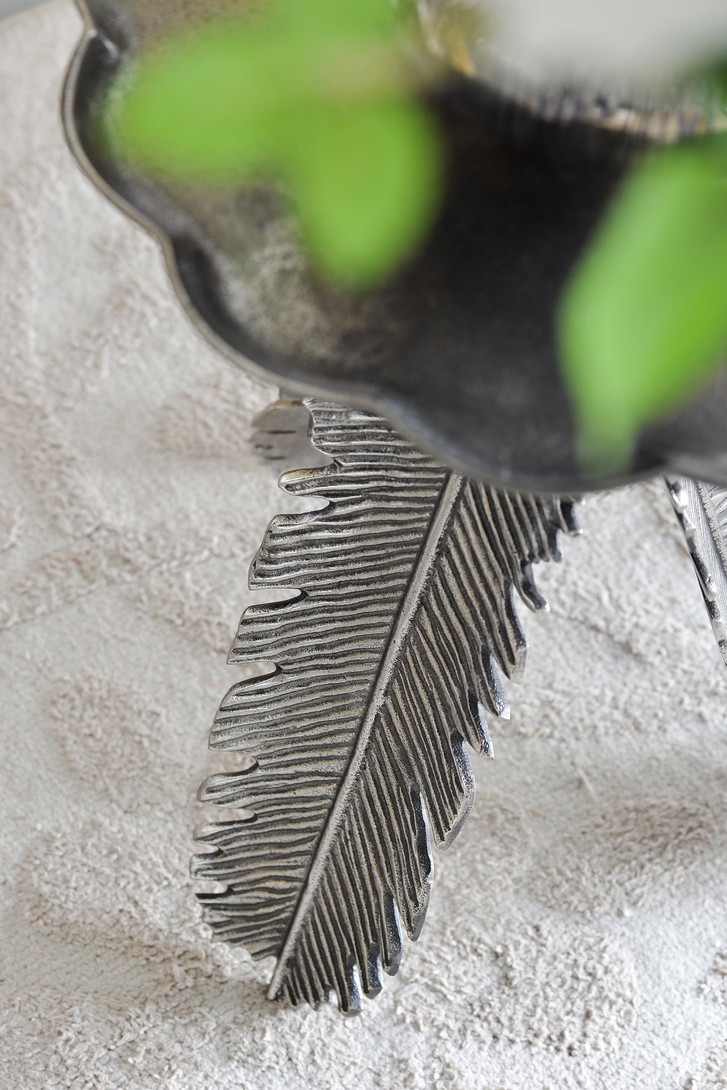 Silver metal tray with sculpted feather accents perfect for decorative display