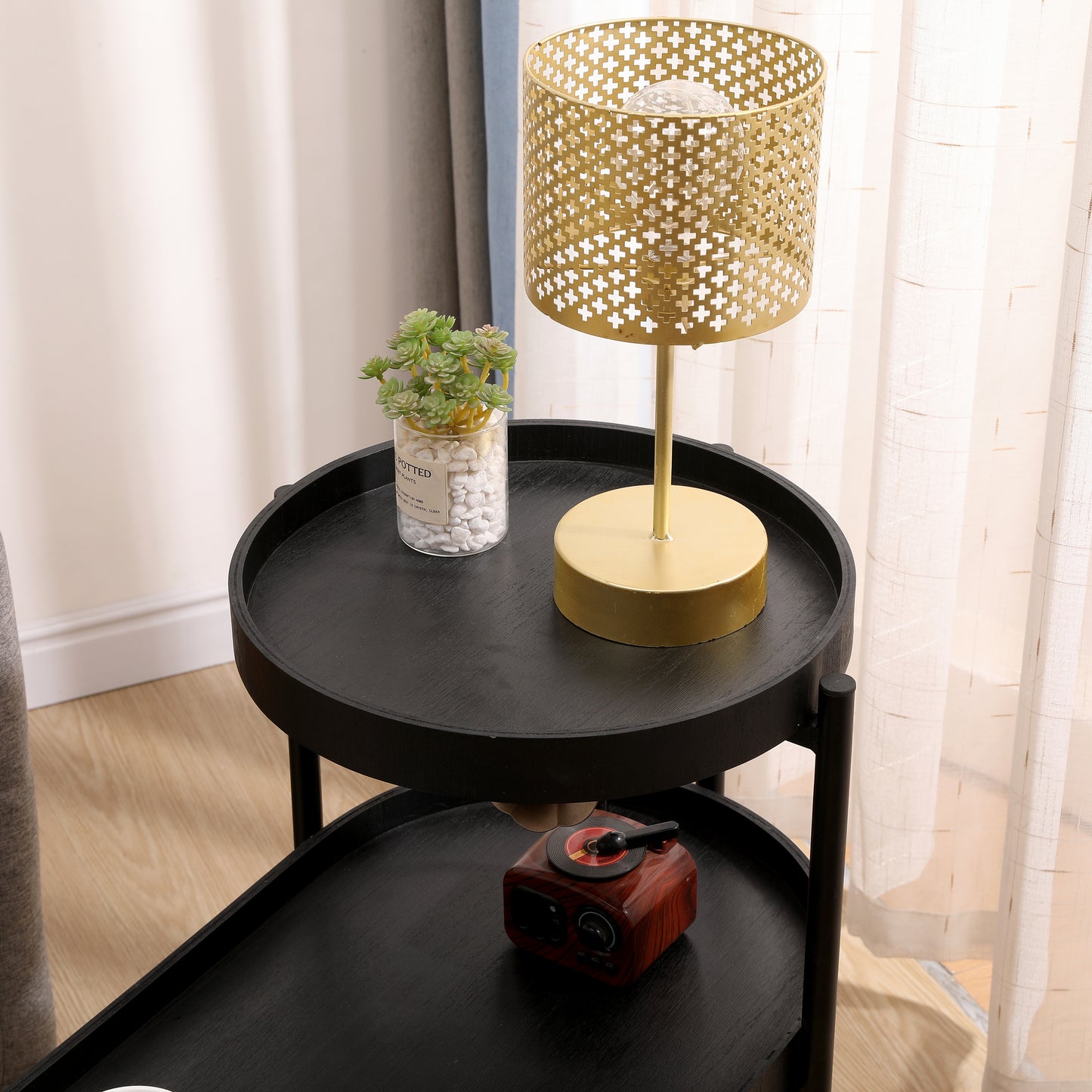 Gold metallic bedside table lamp with intricate geometric cutout shade