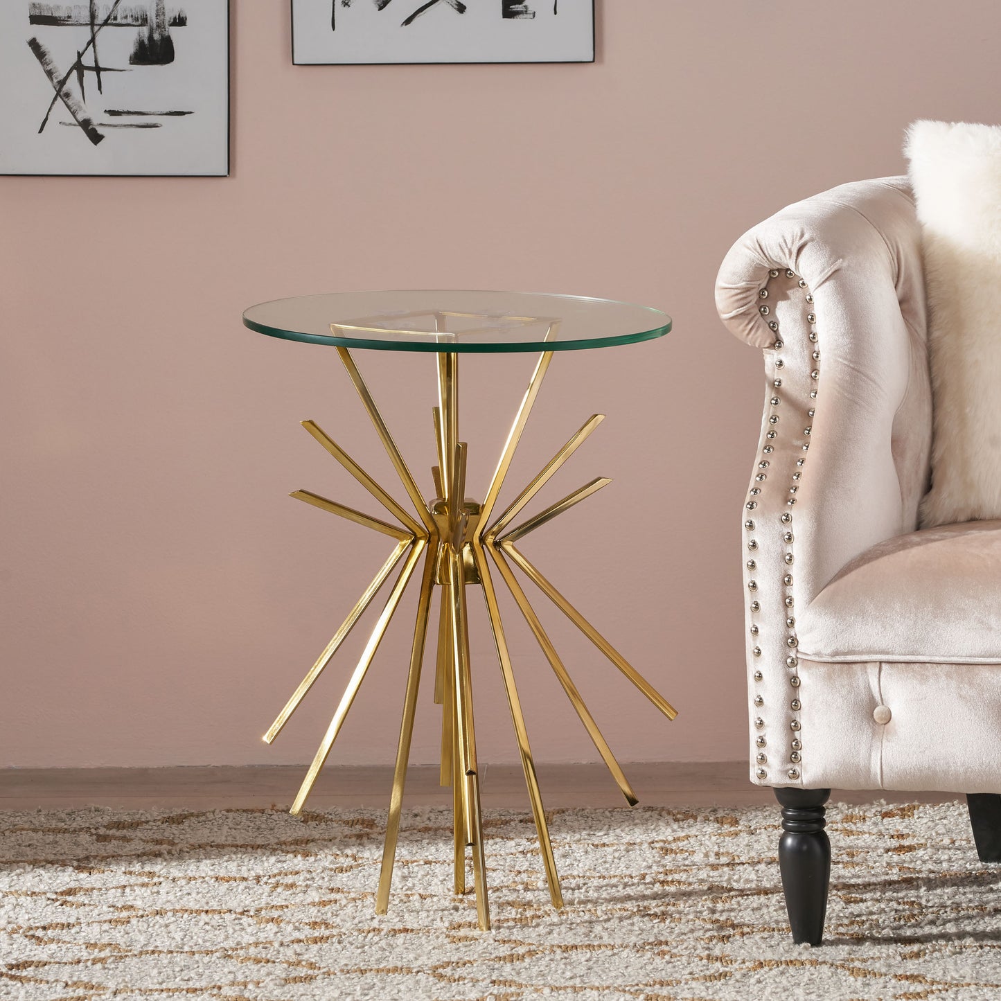 Round glass top accent table with starburst gold metal base