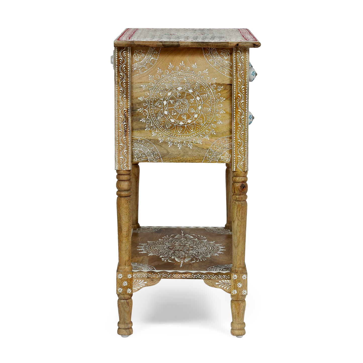 Ornate carved wooden side table with white mandala pattern and blue ceramic knobs
