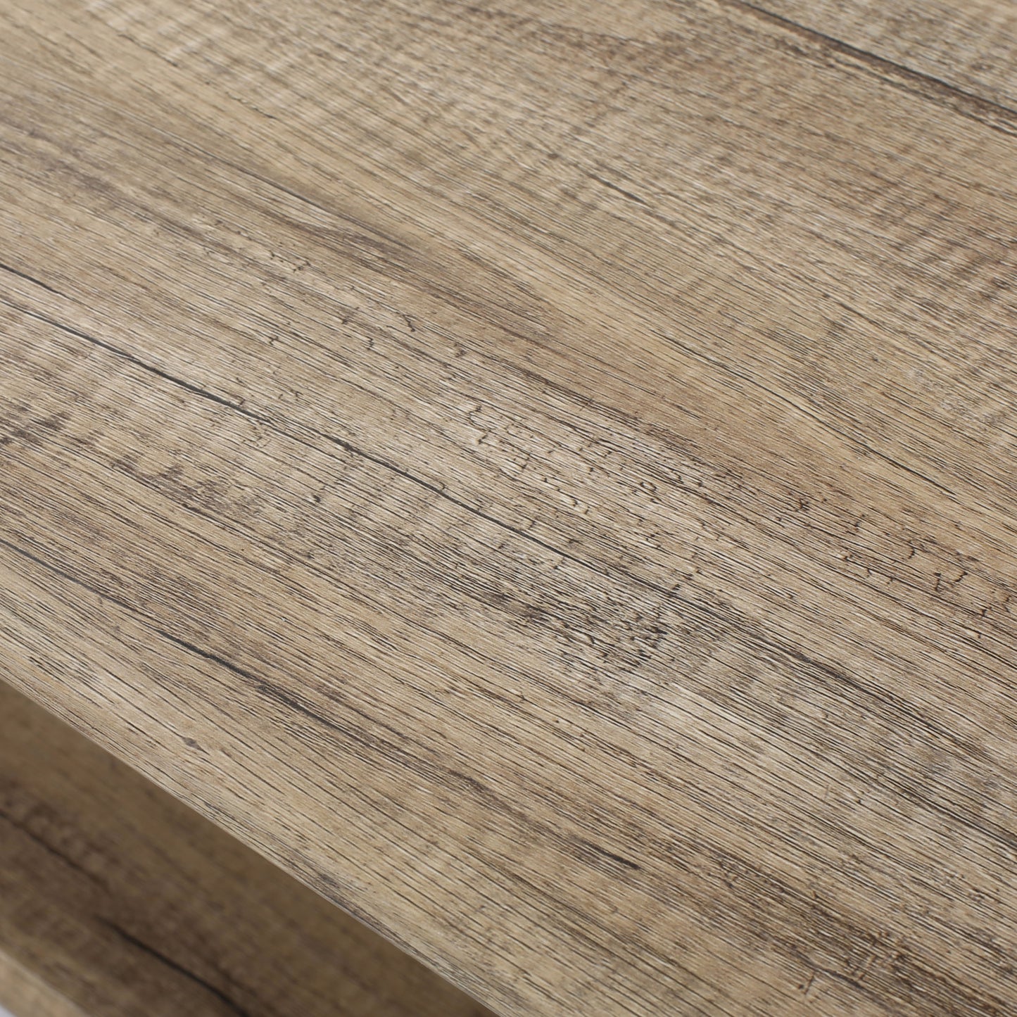 Closeup of a rustic oak wood veneer tabletop with natural grain patterns