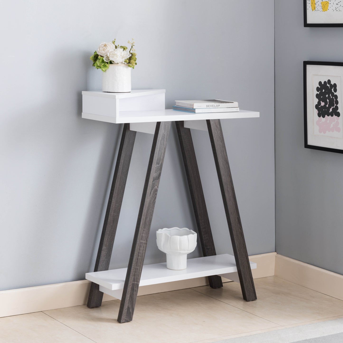 Modern white console table with dark gray angled legs and two shelves