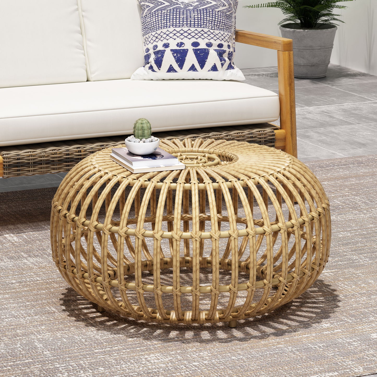 Natural woven rattan round coffee table with intricate knot detailing