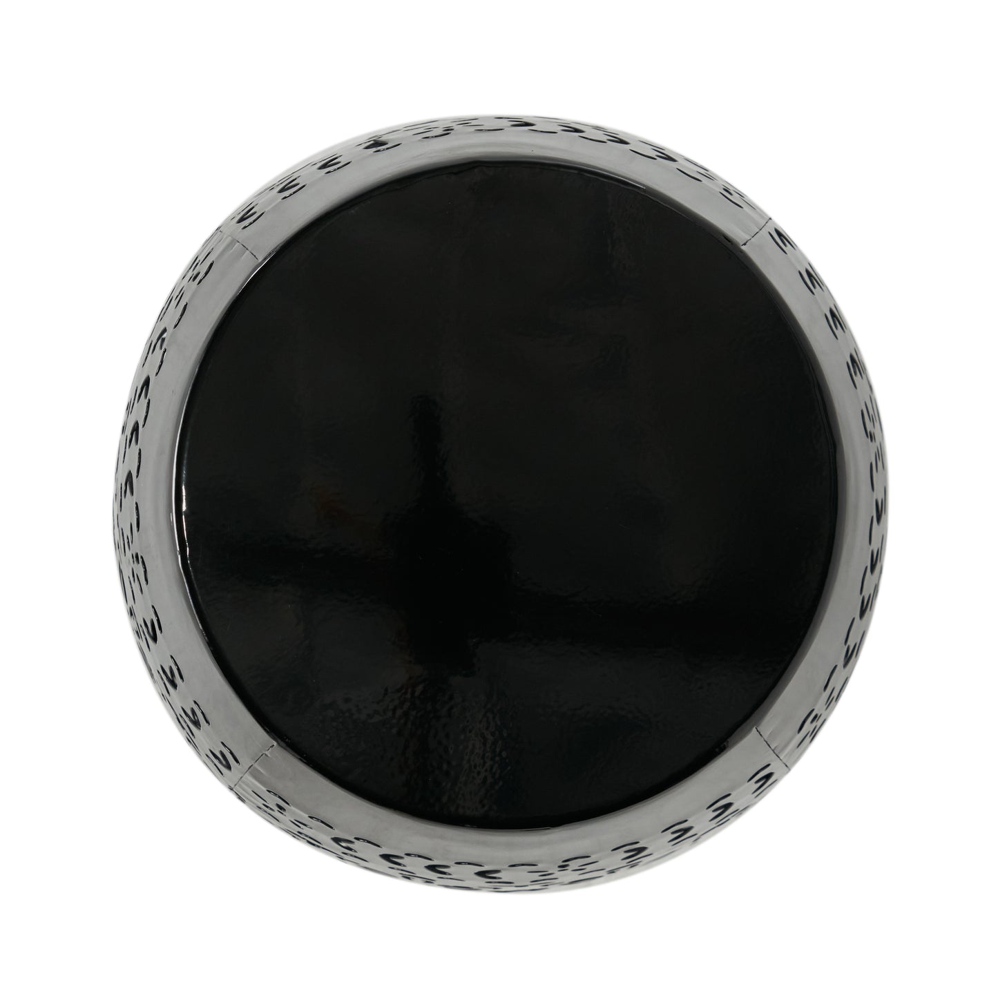 Black metallic round planter with cutout decorative pattern