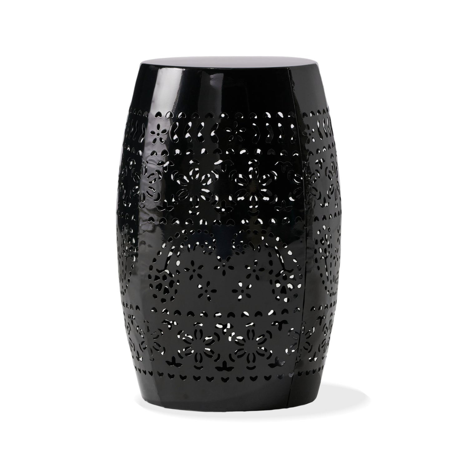 Black metal barrel stool with intricate floral cutouts for outdoor seating