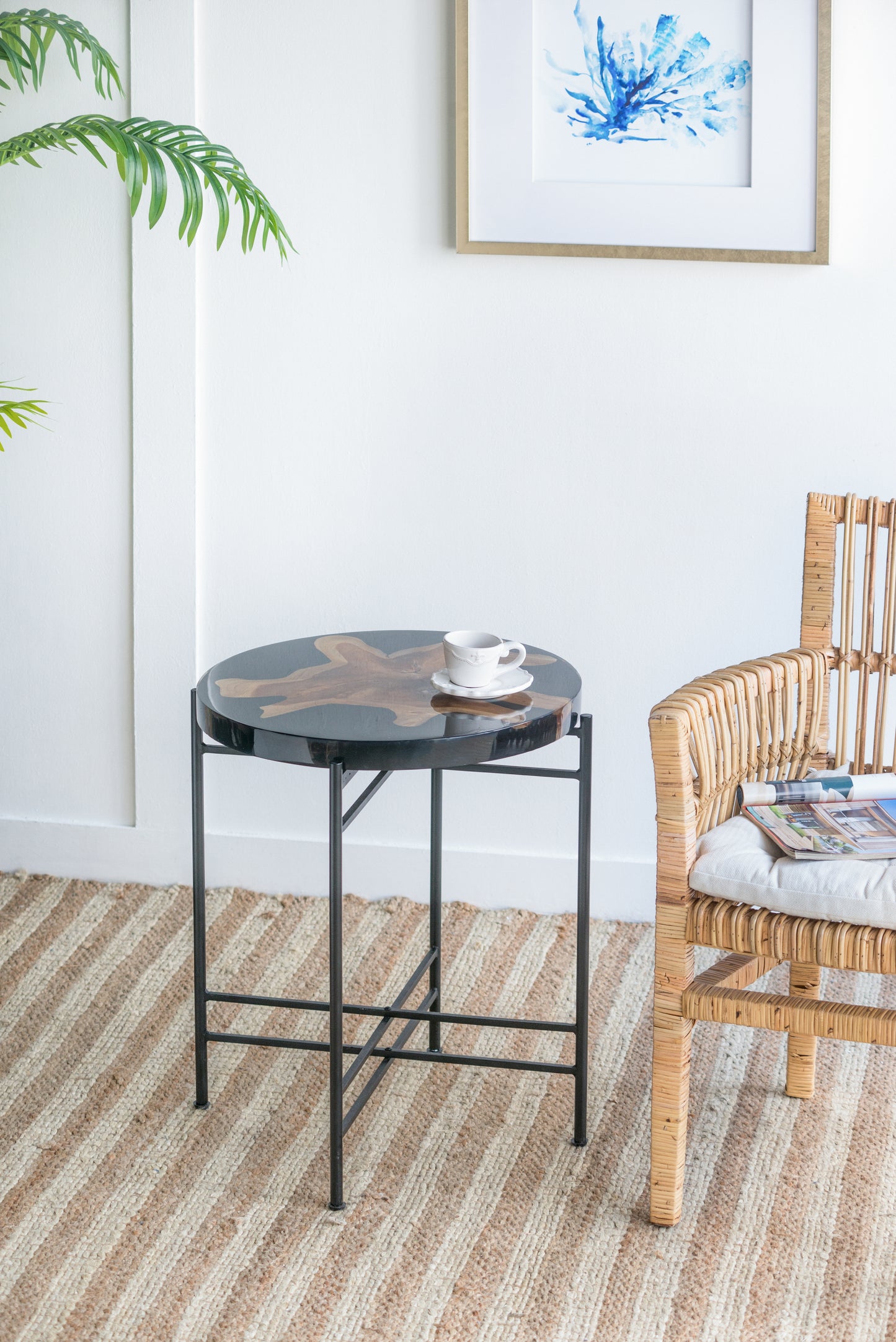 Round wood and resin river table with black metal legs