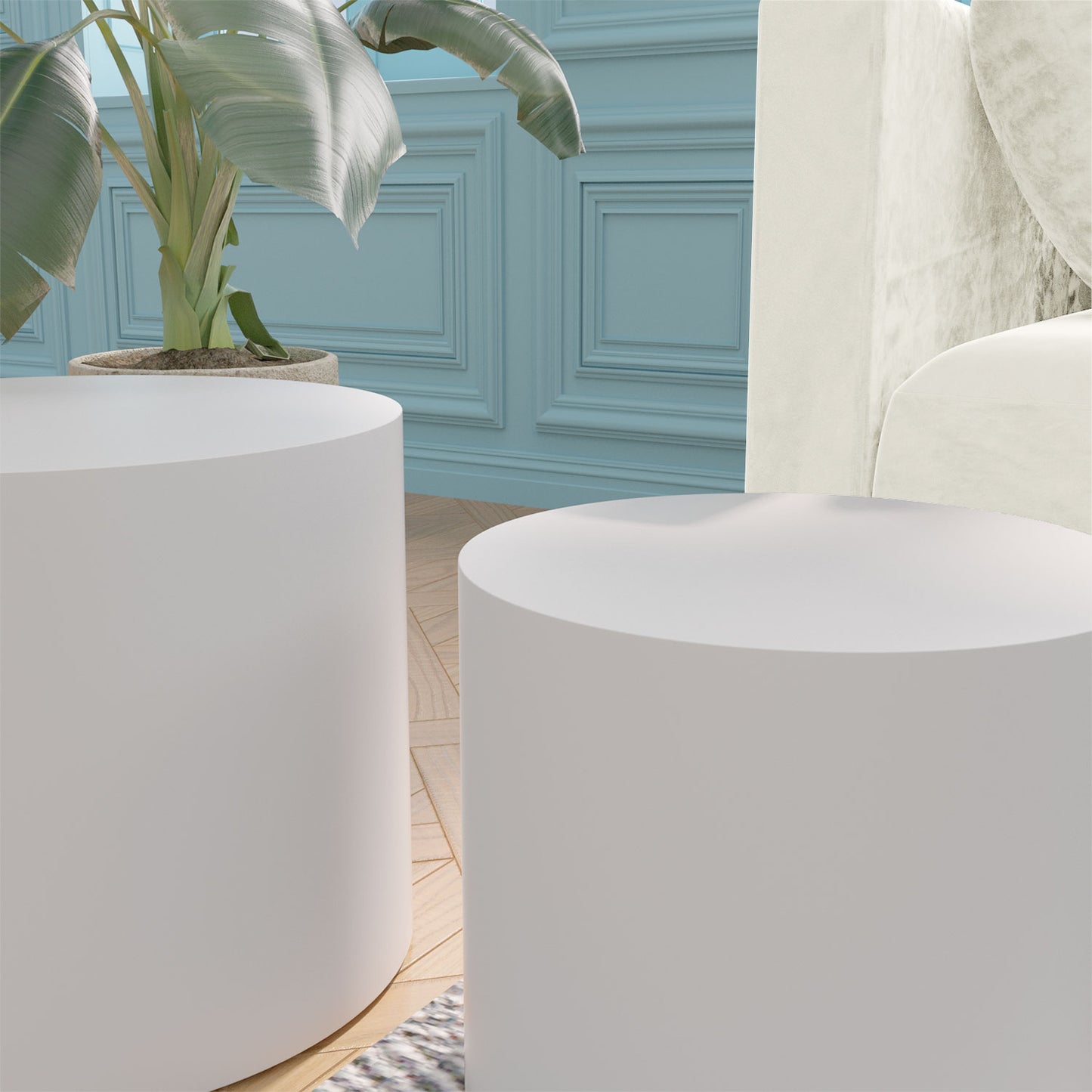 Two white cylindrical plinths on a wooden floor perfect for product displays