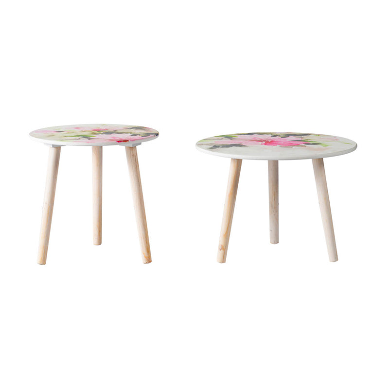 Two round side tables with floral print and light wood legs